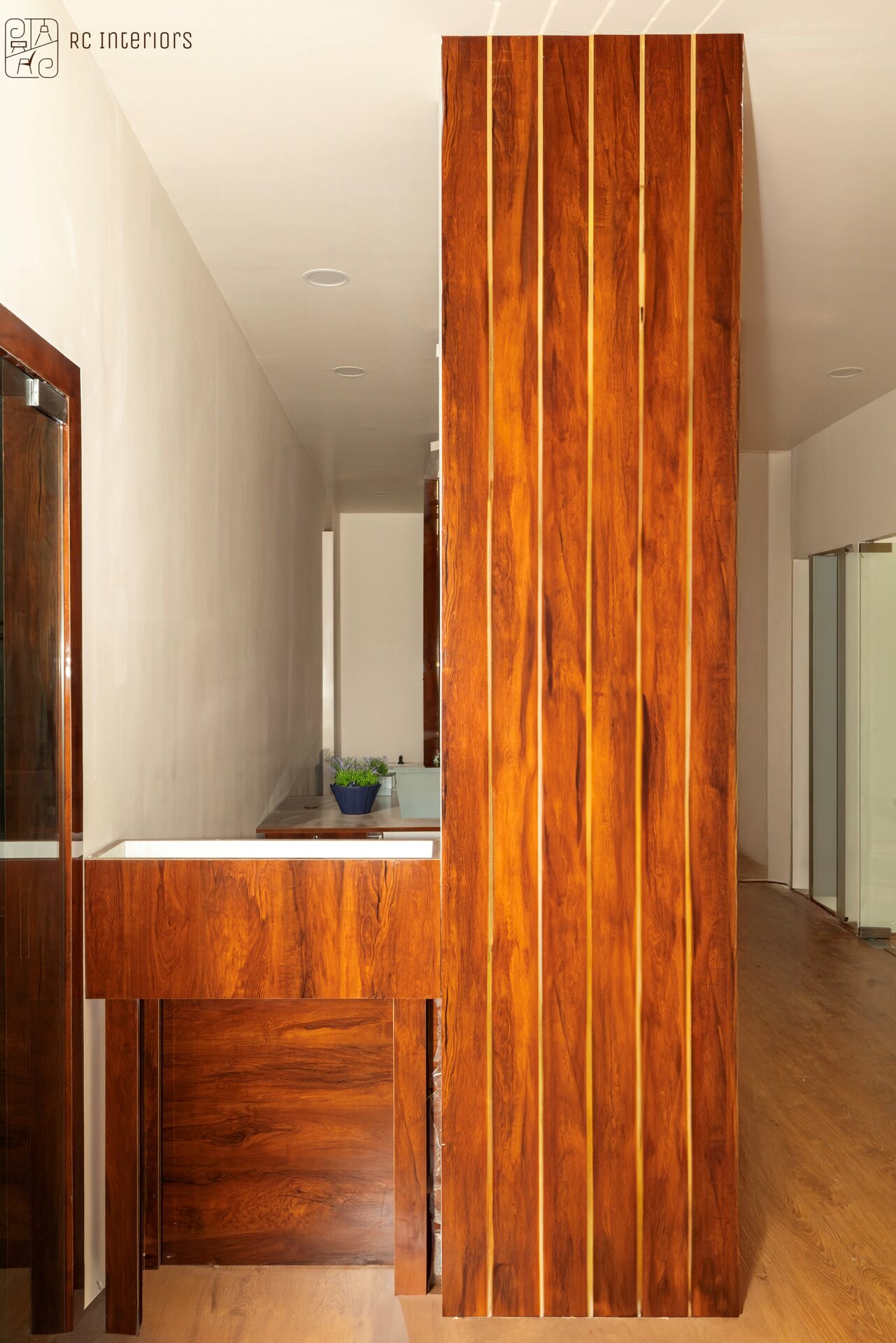 Premium interior — solid wood feature wall — RC Interiors Bengaluru